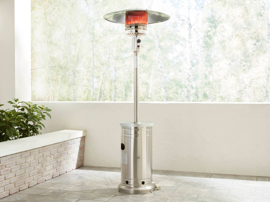 stainless steel patio heater on covered patio