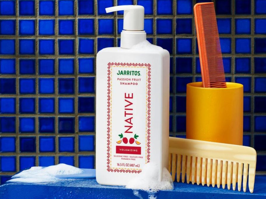 A bottle of Native body wash on a sink