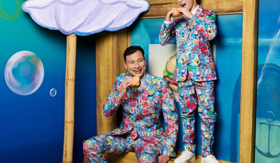 A man and a boy wearing Opposuits with SpongeBob prints