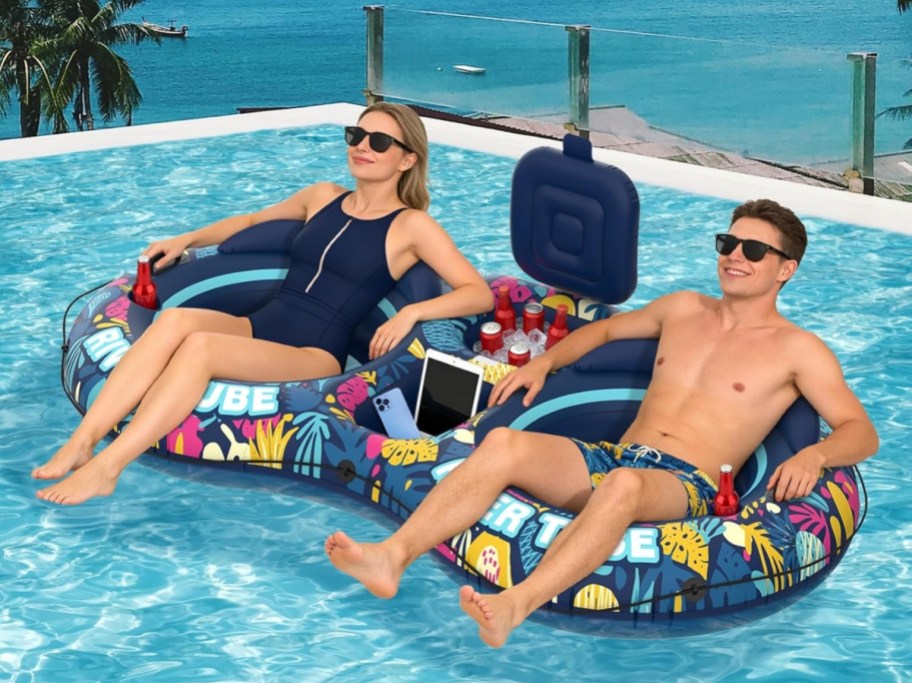 two people on a pool float in a pool