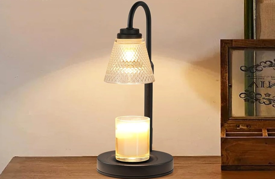 candle warmer lamp on a wood table