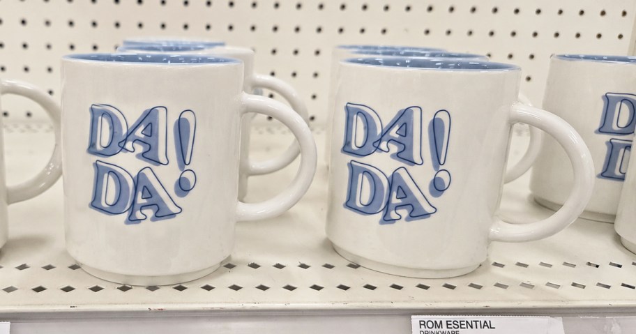 white and blue coffee mugs that say dada!