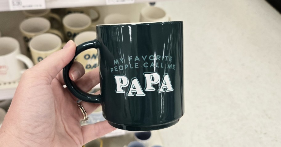hand holding a mug that says "my favorite people call me papa"
