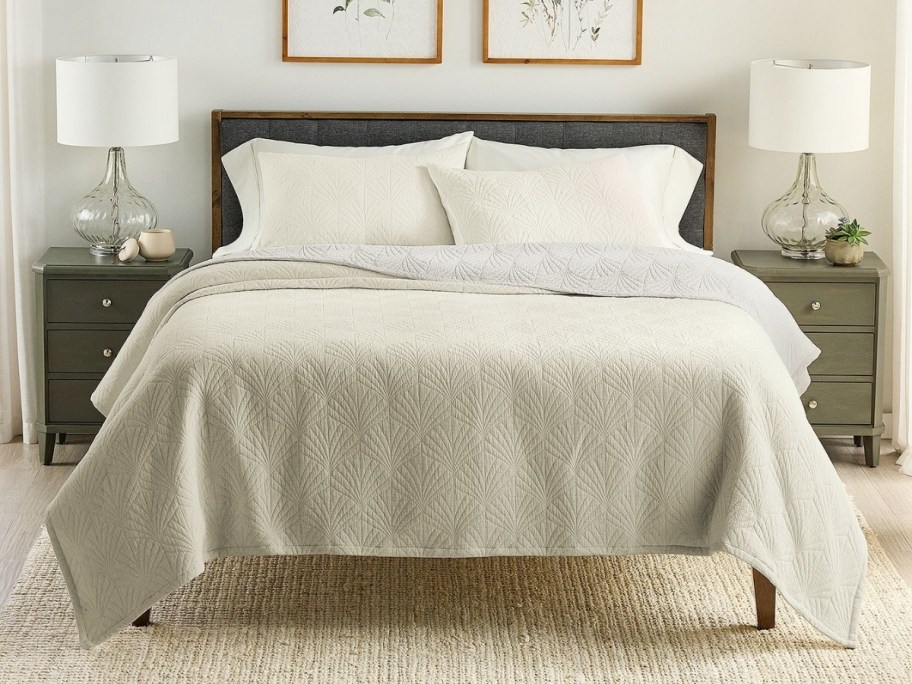 ivory quilt on a bed