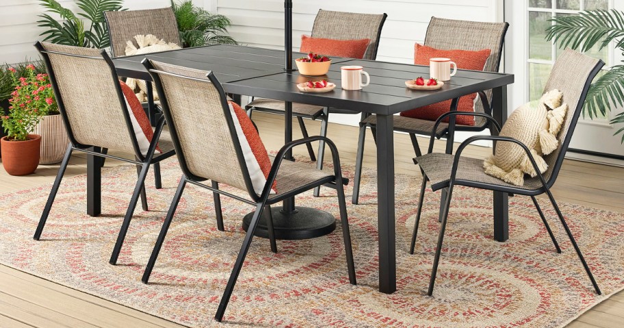 sling chairs around a patio table