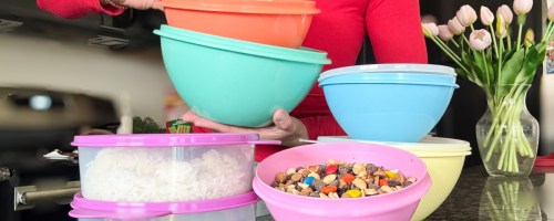 woman using Tupperware Vintage Set in kitchen