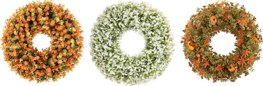 three orange and white wreaths