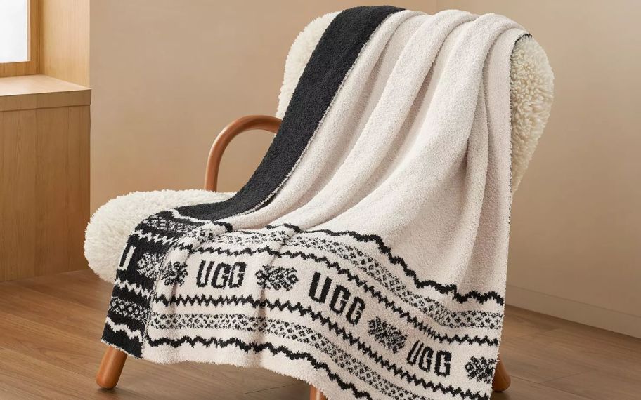 UGG throw blanket sitting on top of a chair