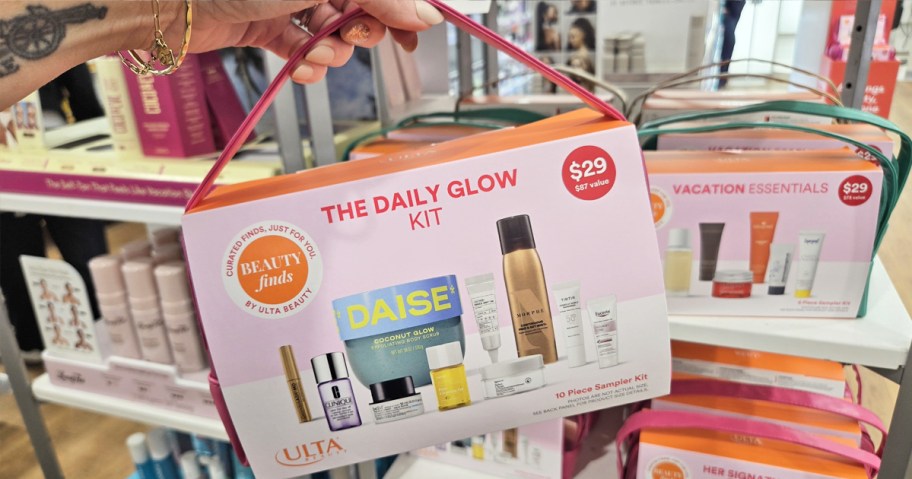 hand holding up ULTA Beauty The Daily Glow Kit in store