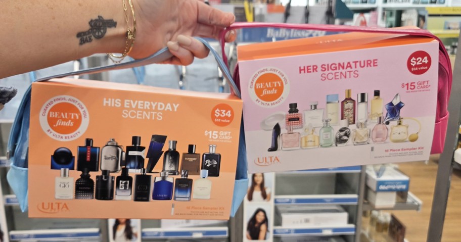 hand holding two fragrance sample kits