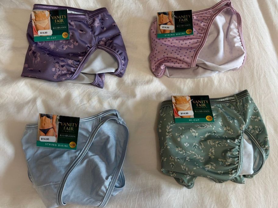 4 pairs of vanity Fair Underwear folded on a bed
