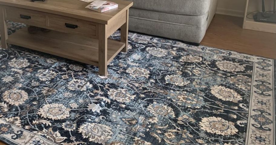 A blue flroal washable area rug