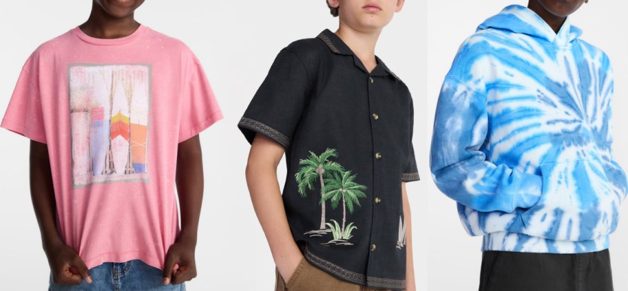 Three boys' tops featuring a pink graphic t-shirt with surfboards, a black short-sleeve button-down shirt with embroidered palm trees, and a blue tie-dye hoodie.