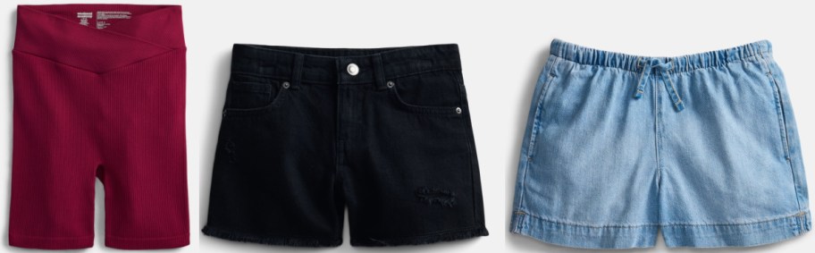 Three pairs of shorts featuring maroon ribbed biker shorts, black distressed denim shorts, and light blue drawstring denim shorts.