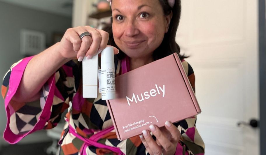 Woman holding musely skincare