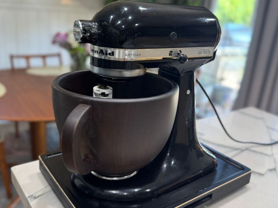 kitchenaid stand mixer wit6h a wooden mixing bowl with handle