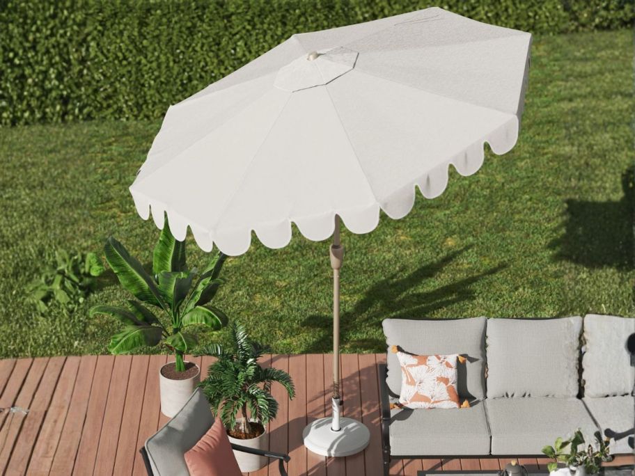 allen + roth 9' Aluminum Beige Auto-Tilt Market Patio Umbrella on deck