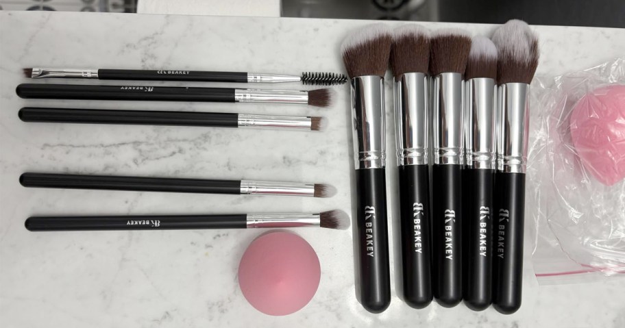 makeup brush set on a table 