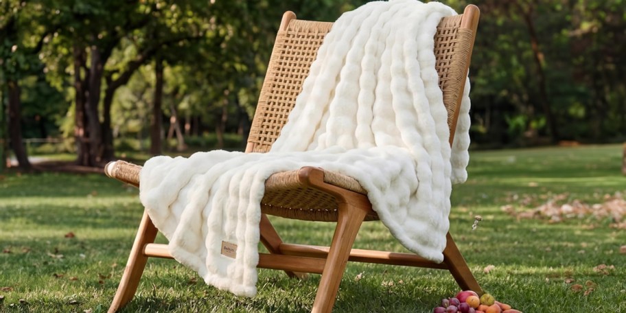 white blanket on chair 