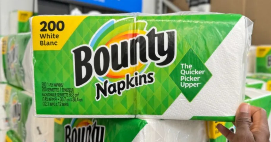 hand reaching for a pack of Bounty Napkins