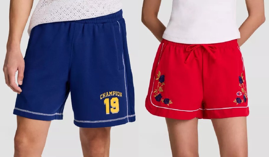 Two pairs of Champion athletic shorts worn by models, featuring blue mesh shorts with "Champion 19" lettering on the left and red drawstring shorts with blue floral embroidery on the right.