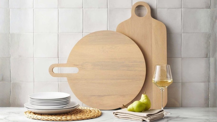 two members mark wooden charcuterie boards