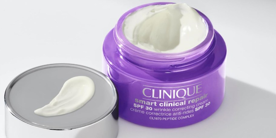 clinique smart cream jar on table with lid off