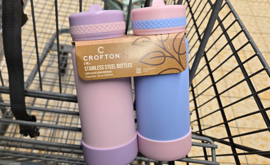 purple and blue water bottles in cart 