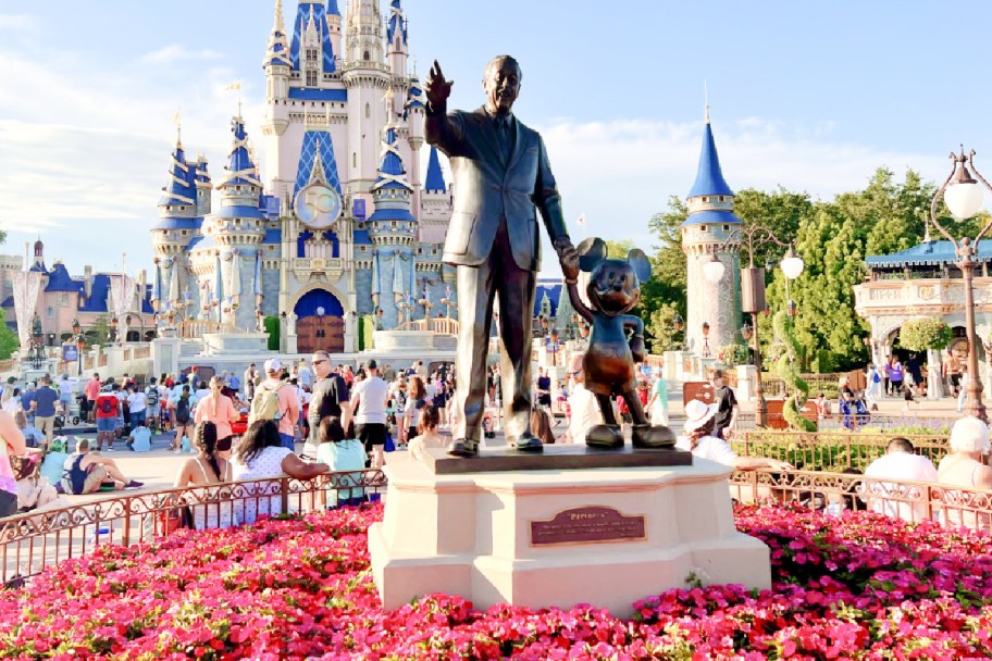 walt disney and mickey statue in walt disney world