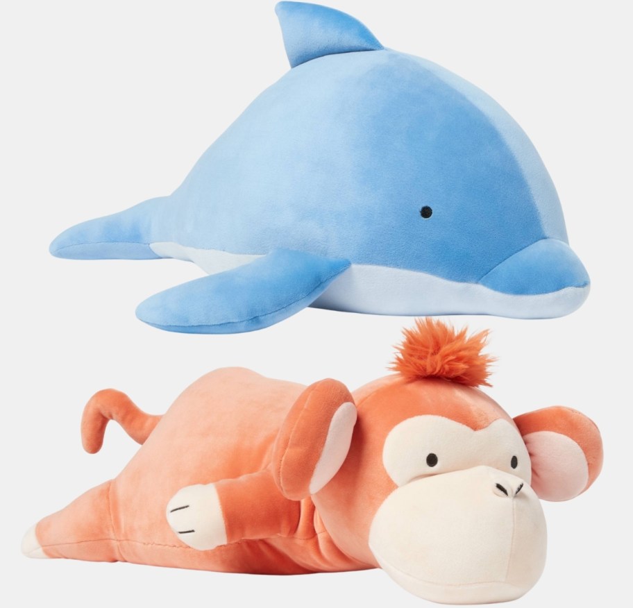 dolphin and monkey weighted plush throw pillows