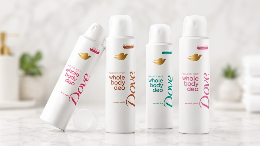 dove whole body deoderant bottles in 4 different scents on bathroom counter top