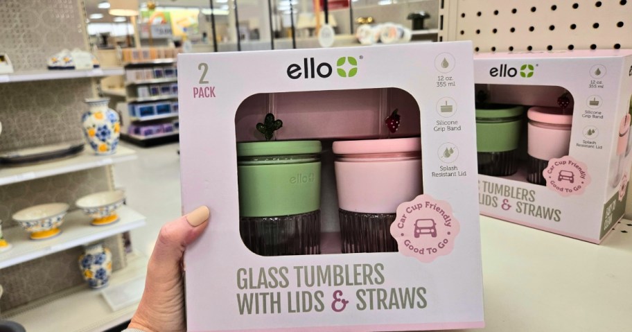 hand holding a 2-pack of Ello glass tumblers