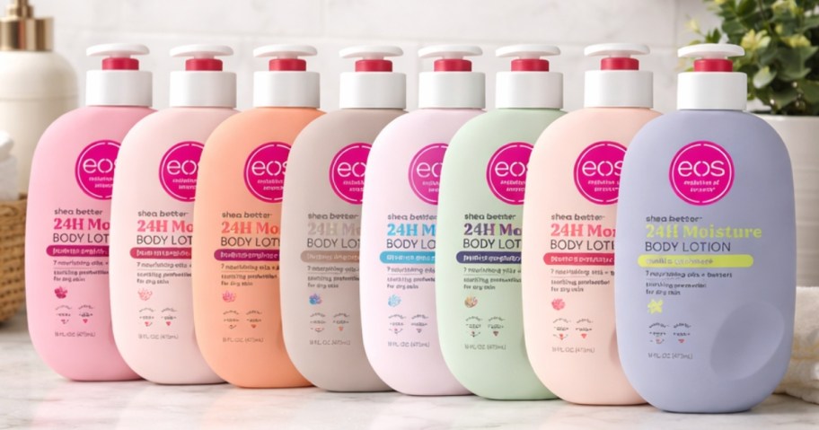 several bottles of eos body lotion on a bathroom counter