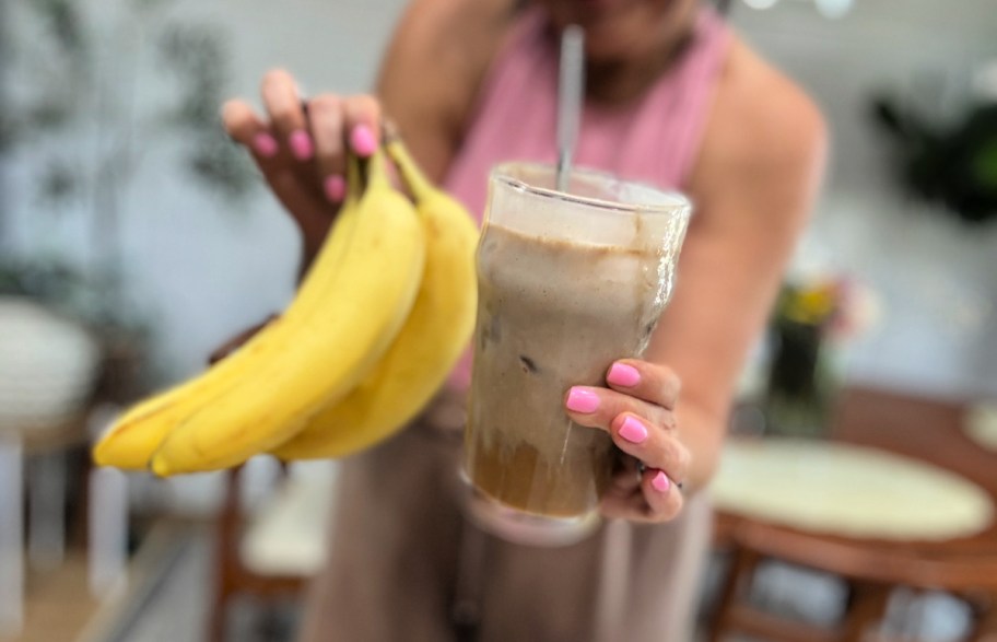 holding a banana coffee latte 
