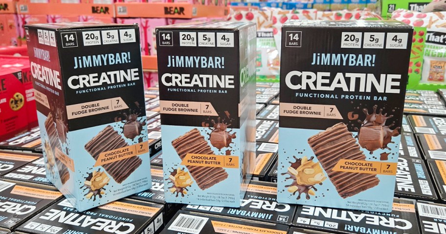 three boxes of jimmybar creatine protein bars 