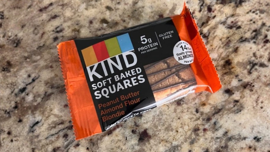 kind soft baked squares bar on a countertop