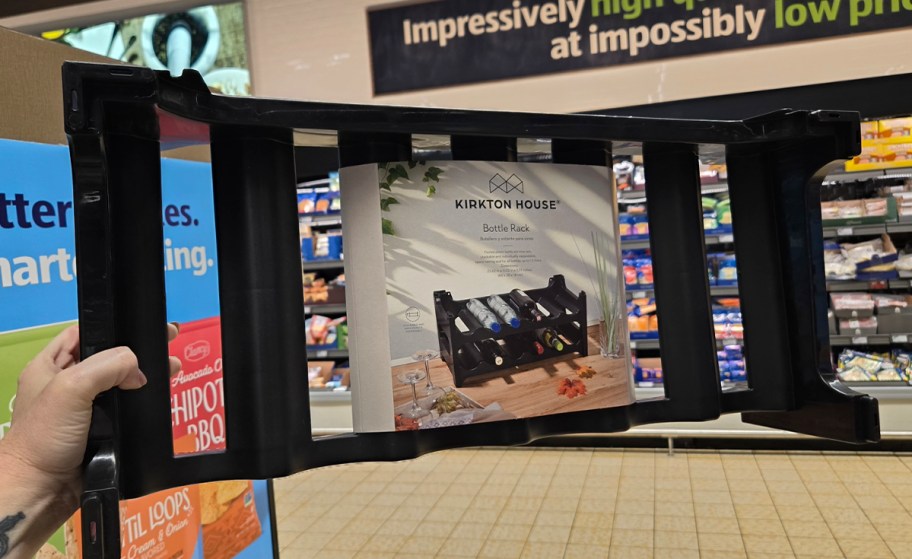 hand holding bottle rack 