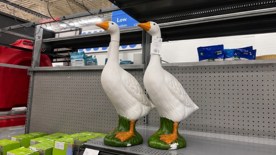 two mainstays porch geese on a store shelf. 