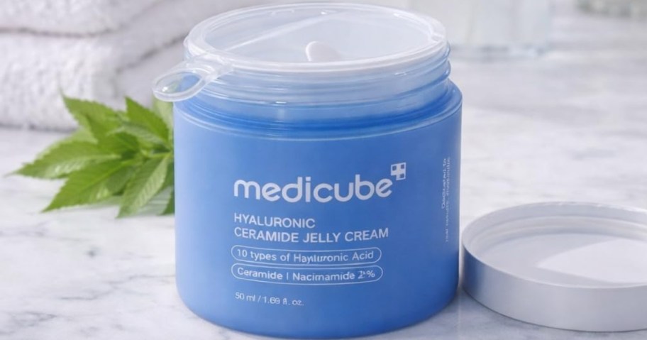 a container of medicube Jelly Cream with Hyaluronic Acid on a counter