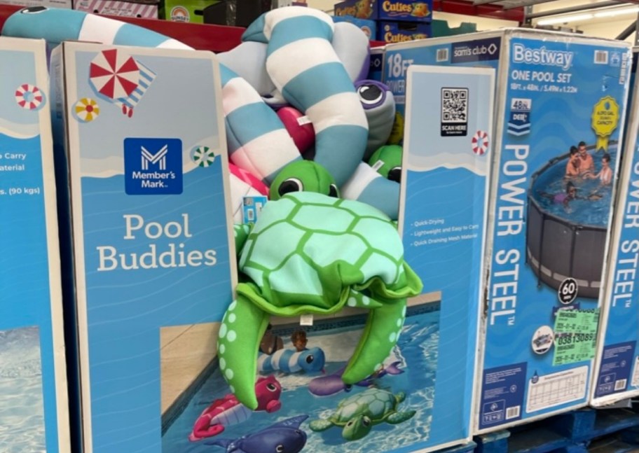 members mark pool buddies in a bin in a store