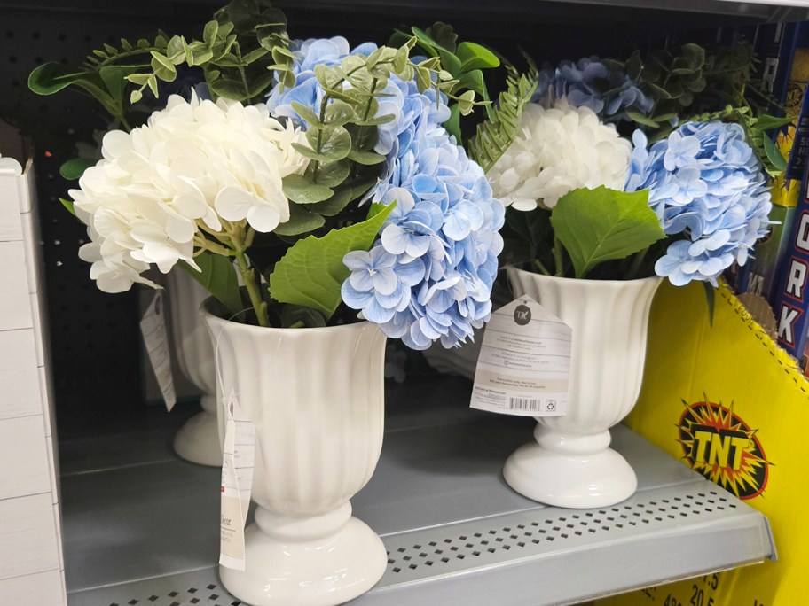 white and blue hydrangeas in vase 