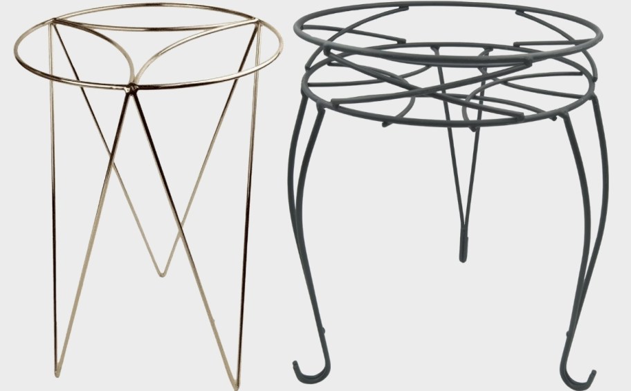 gold metal and black metal plant stands