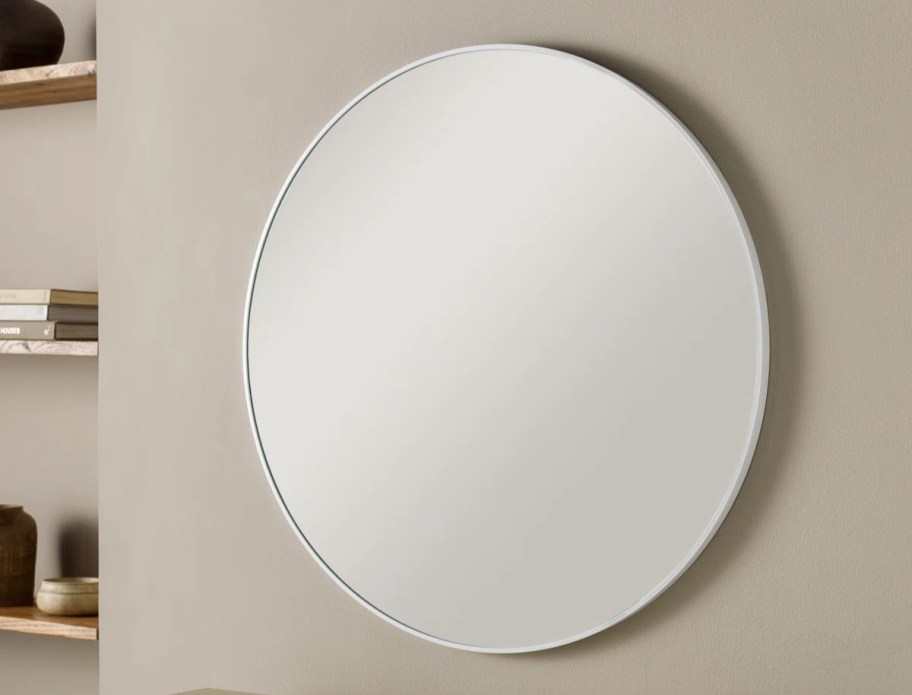 round mirror with a sliver frame