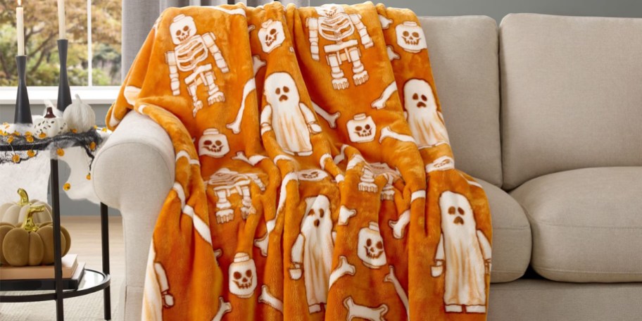 orange lego halloween blanket on couch