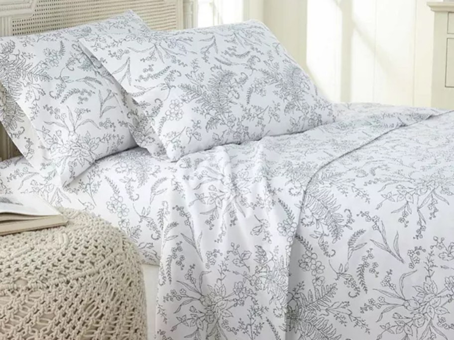 floral white sheet set on bed