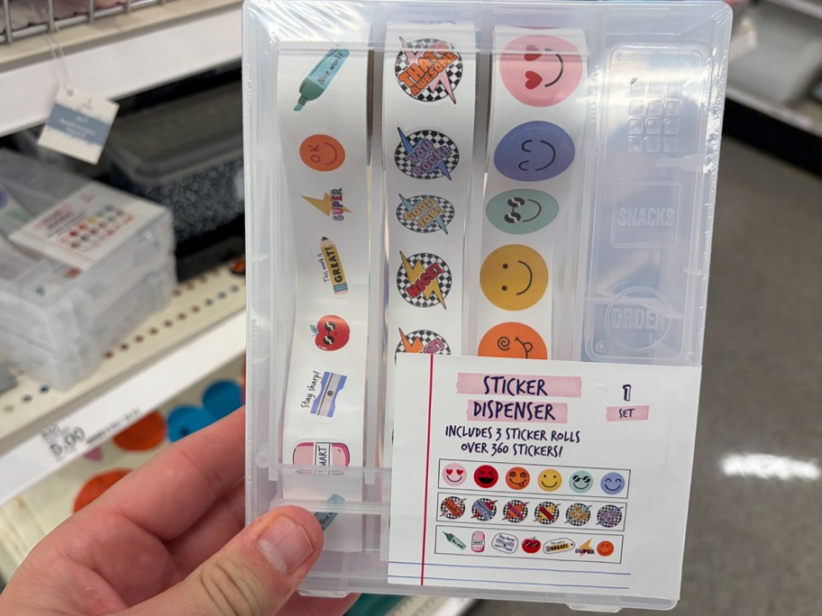 hand holding sticker pack