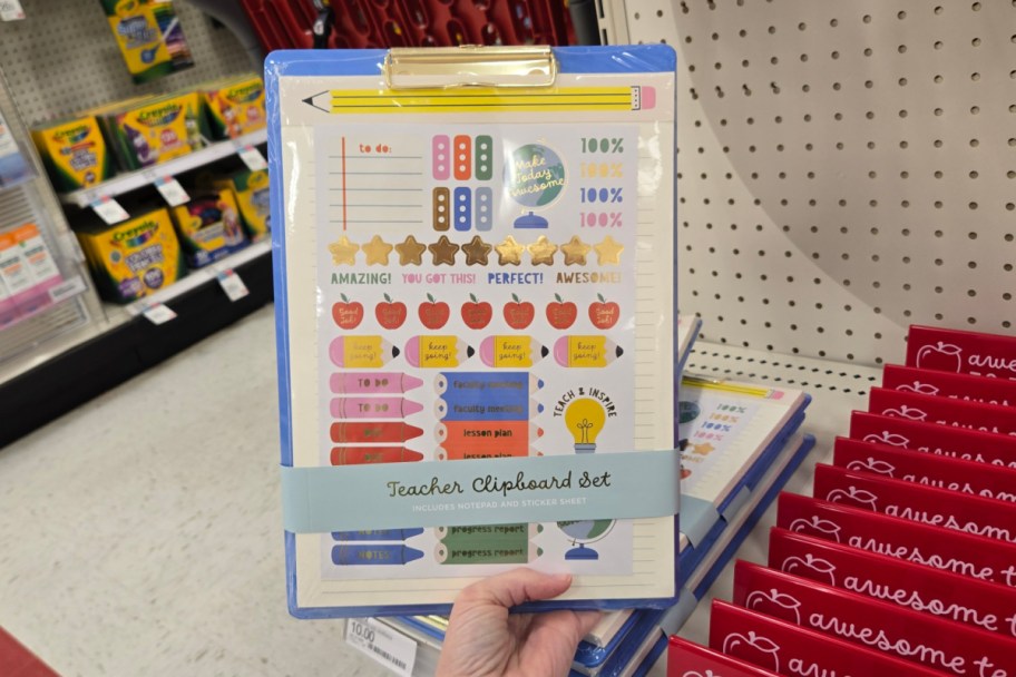 hand holding clipboard in store