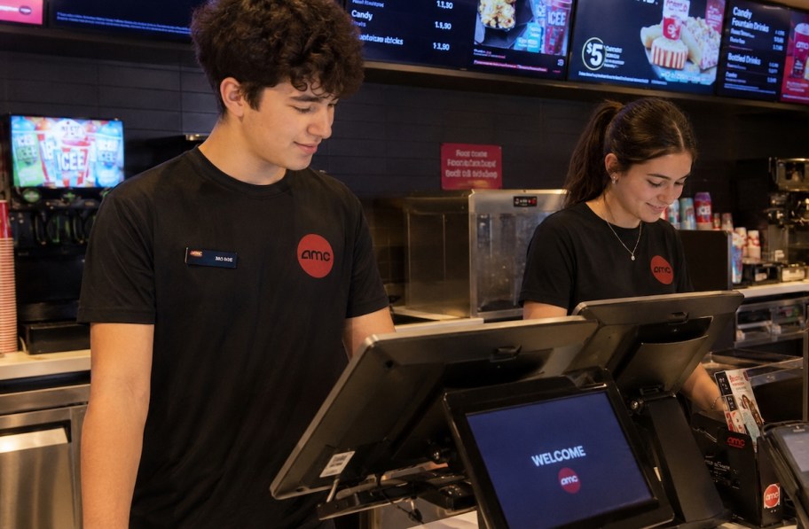 boy and girl teen working at movie theater concession stand