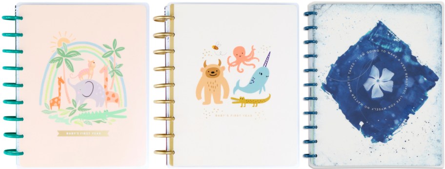 Three notebook covers are shown. The first has a pastel jungle theme with animals and a rainbow. The second features colorful, playful creatures. The third has an abstract blue design with a flower and text.