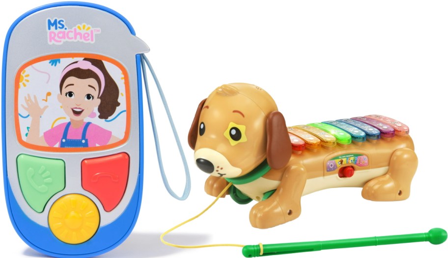 Toy phone featuring Ms. Rachel and a xylophone dog. The phone is colorful with buttons, and the dog has xylophone keys on its back.